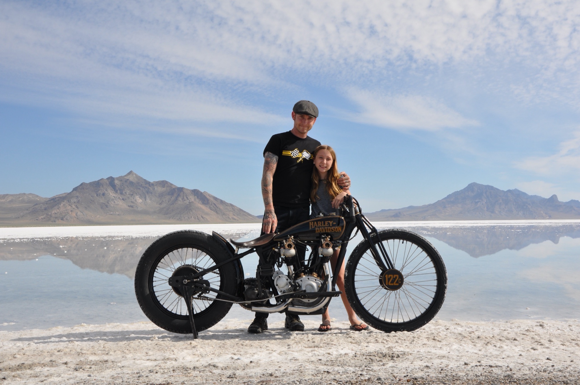 Justin and his daughter at the salt flats with a hand-built bobber.